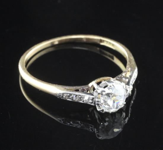 An early 20th century 18ct gold single stone diamond ring, size N.